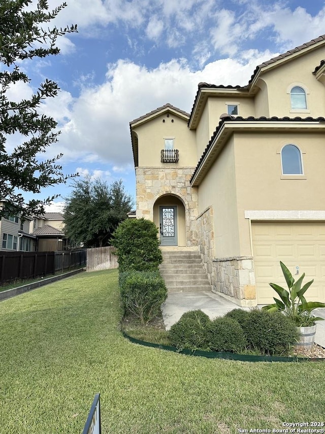 view of property exterior featuring a garage and a yard