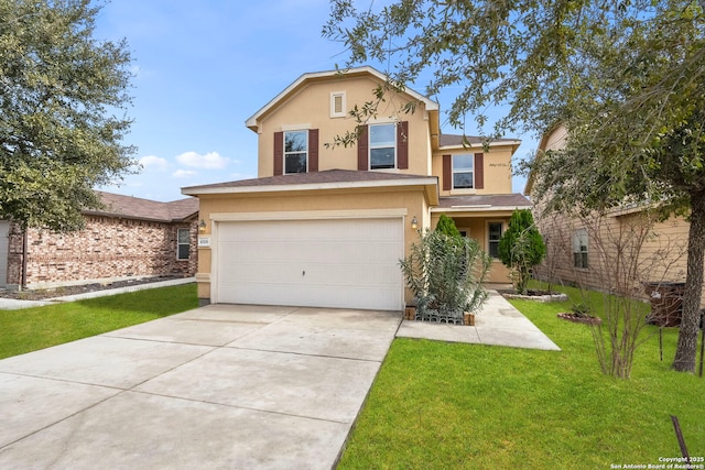 view of front facade with a garage and a front yard