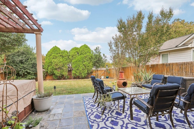 view of patio / terrace with a fenced backyard and a pergola