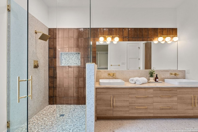 bathroom with vanity and walk in shower