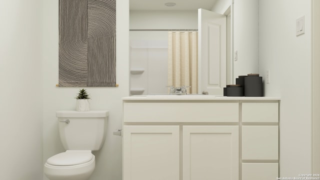 bathroom with a shower with curtain, vanity, and toilet