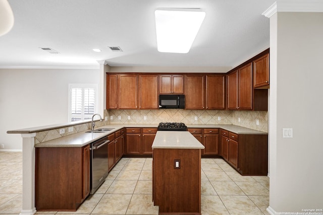 kitchen featuring light tile patterned flooring, sink, crown molding, a kitchen island, and black appliances