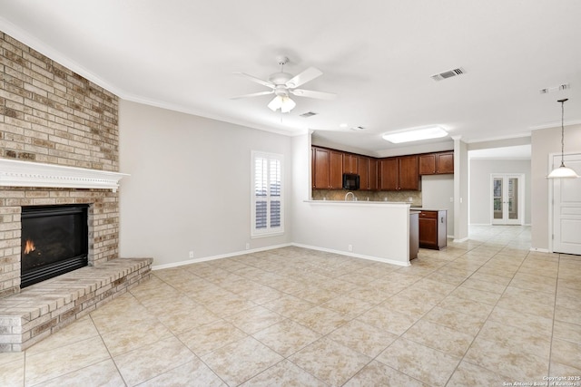 unfurnished living room featuring ornamental molding, a brick fireplace, light tile patterned floors, and ceiling fan