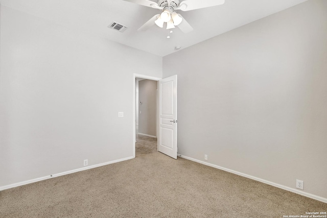 spare room with carpet flooring and ceiling fan