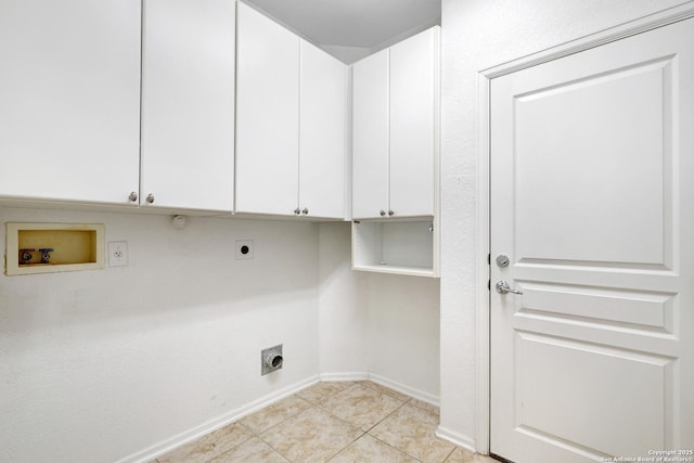 laundry area featuring light tile patterned flooring, cabinets, hookup for an electric dryer, and hookup for a washing machine