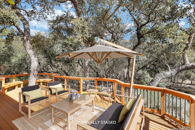 wooden deck featuring an outdoor hangout area