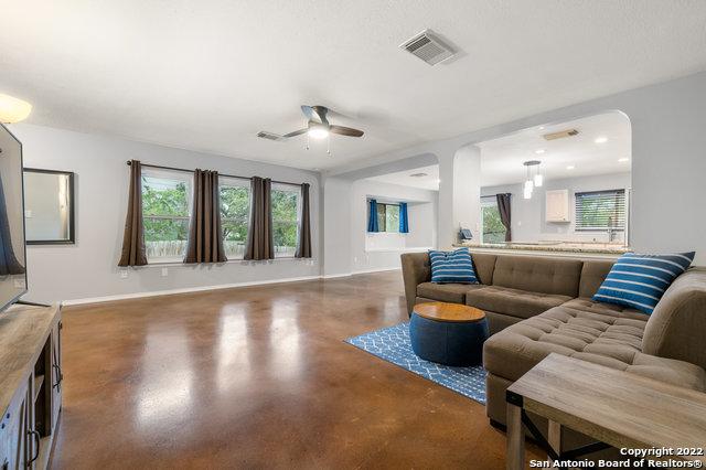 living room with ceiling fan