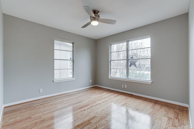 empty room featuring light hardwood / wood-style floors and ceiling fan