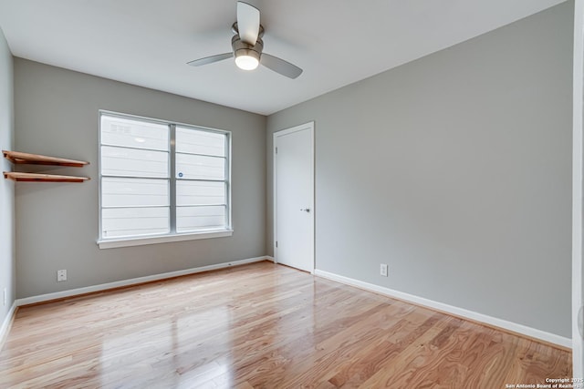 unfurnished room featuring ceiling fan and light hardwood / wood-style flooring