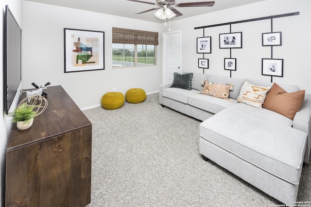 carpeted living room featuring ceiling fan