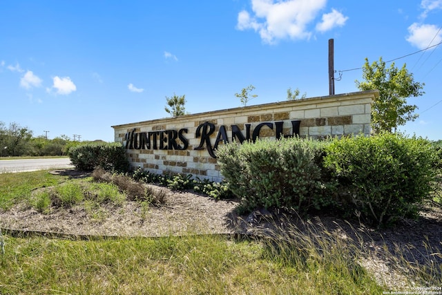 view of community sign