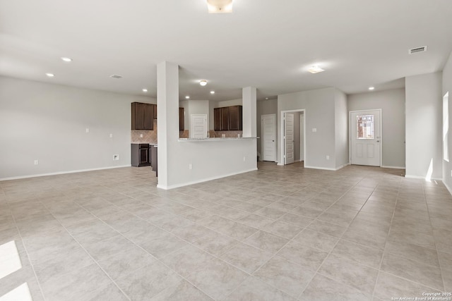 unfurnished living room featuring recessed lighting, visible vents, baseboards, and light tile patterned floors