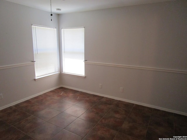 view of tiled empty room