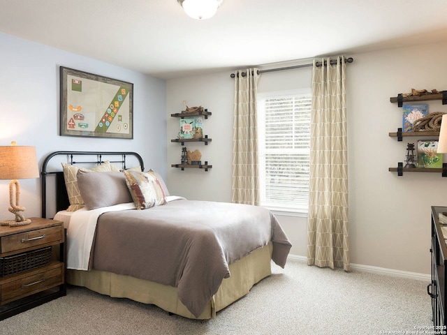 bedroom with light carpet