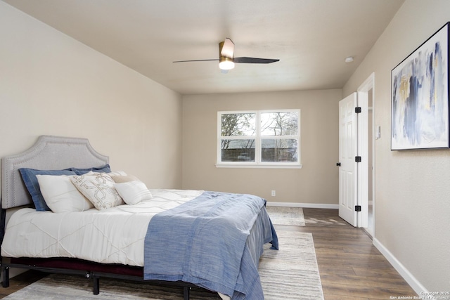 bedroom with hardwood / wood-style flooring and ceiling fan