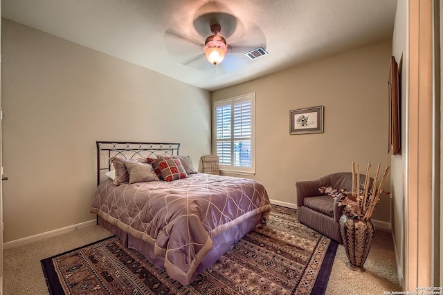 bedroom featuring ceiling fan and carpet flooring