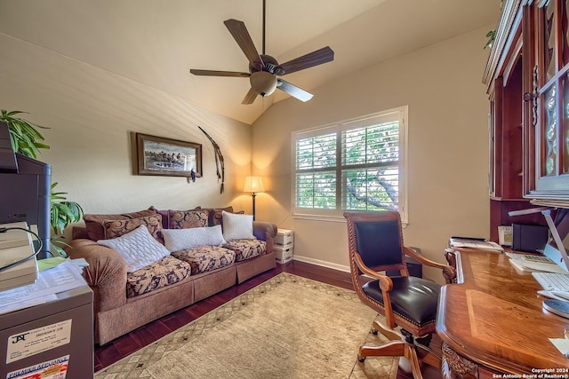 living room with dark wood-type flooring, ceiling fan, and vaulted ceiling