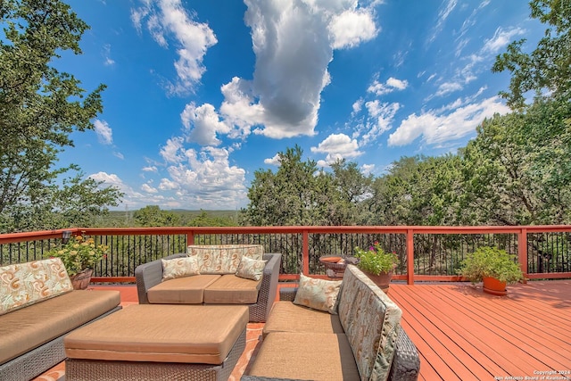 wooden deck with outdoor lounge area