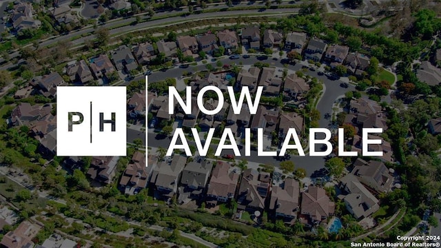 drone / aerial view with a residential view