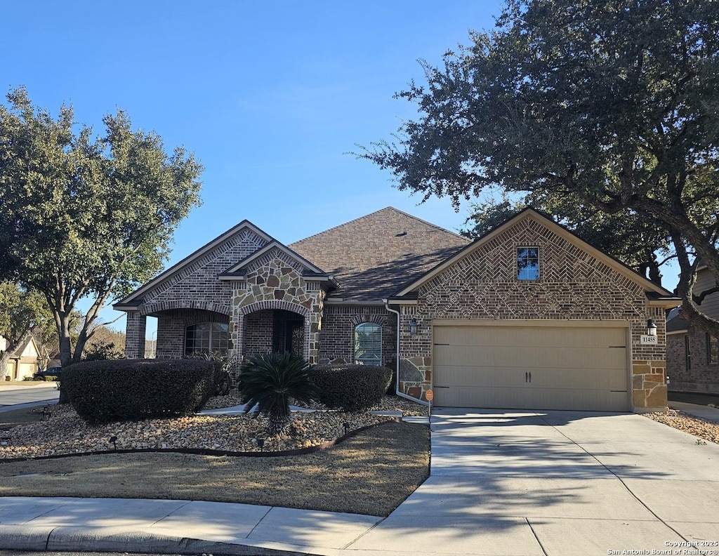 view of front of home with a garage