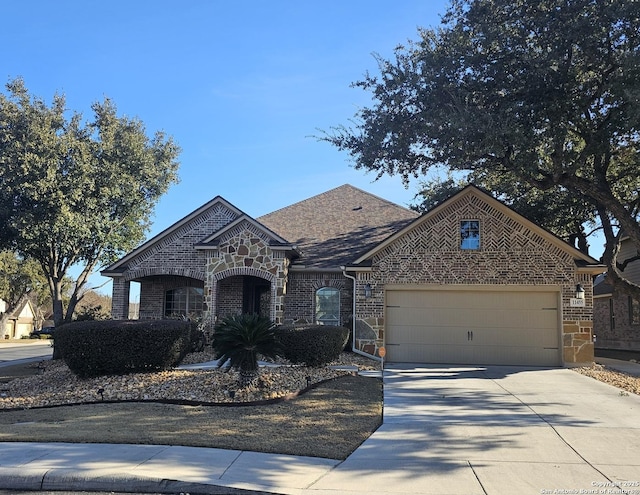 view of front of home with a garage