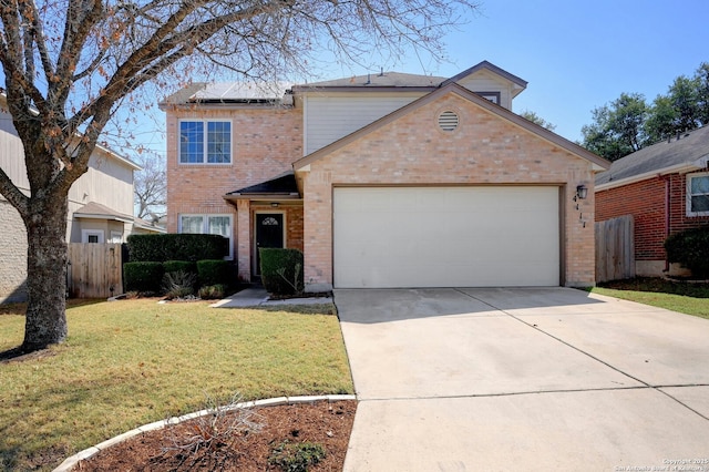 traditional home featuring driveway, brick siding, fence, and roof mounted solar panels