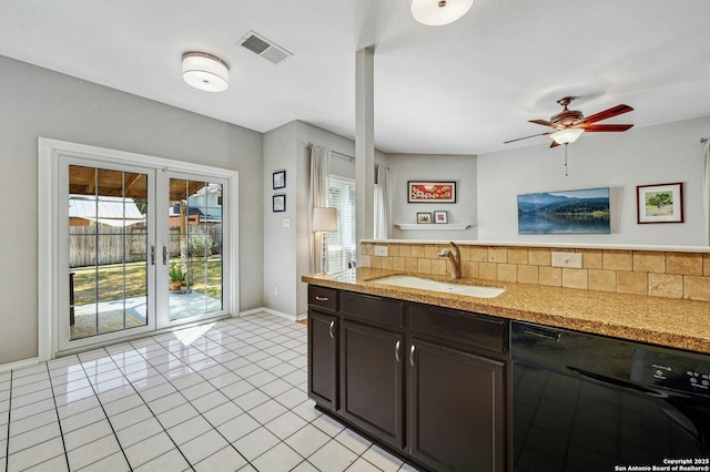 kitchen with dark brown cabinetry, a sink, visible vents, french doors, and dishwasher