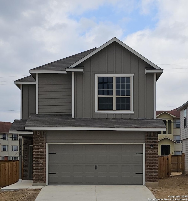 view of front of property featuring a garage