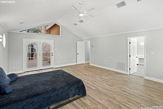 bedroom featuring lofted ceiling, access to exterior, ceiling fan, and light hardwood / wood-style flooring