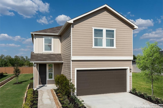 view of front facade featuring a garage and a front yard