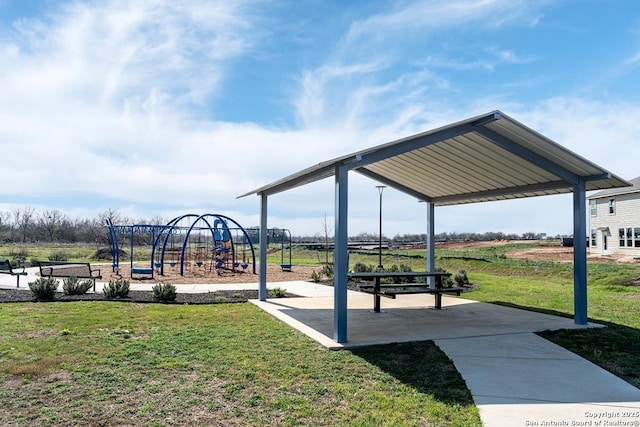 view of play area with a gazebo and a lawn