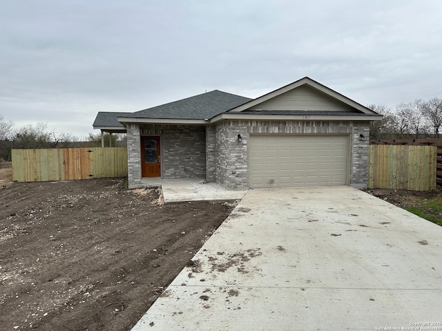 view of front of home with a garage