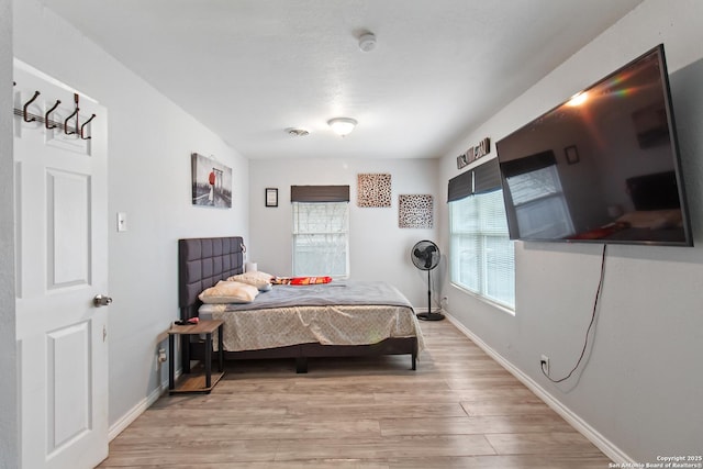 bedroom featuring light hardwood / wood-style flooring