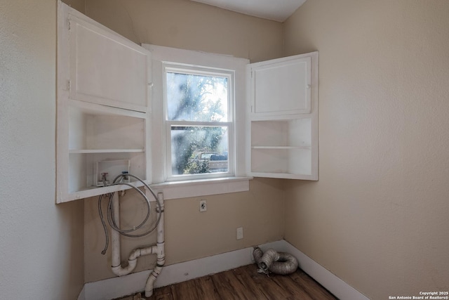 clothes washing area featuring hookup for a washing machine, electric dryer hookup, and hardwood / wood-style floors