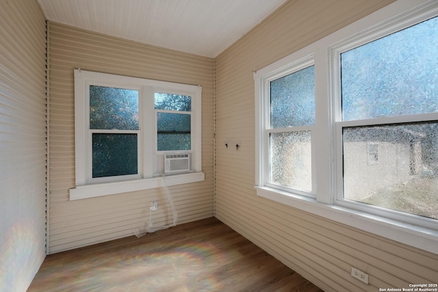 unfurnished sunroom featuring cooling unit