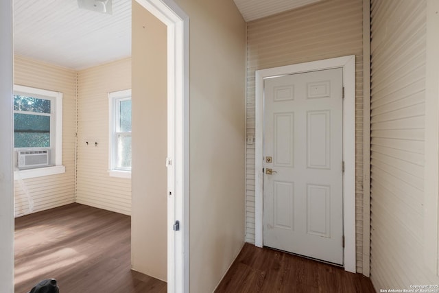 corridor with cooling unit and dark hardwood / wood-style floors