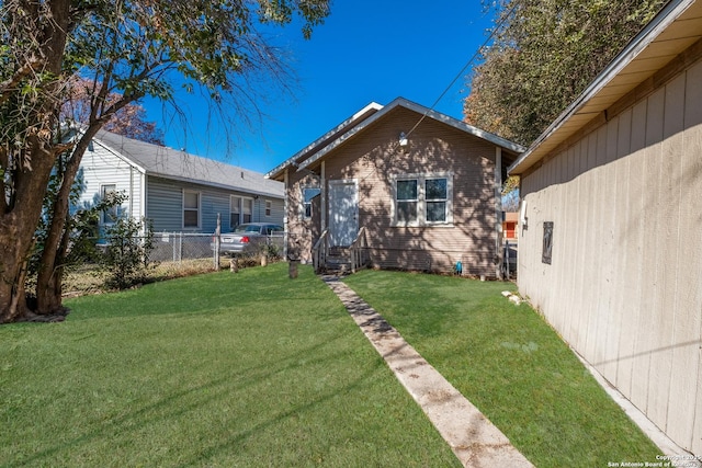 view of front of house with a front lawn