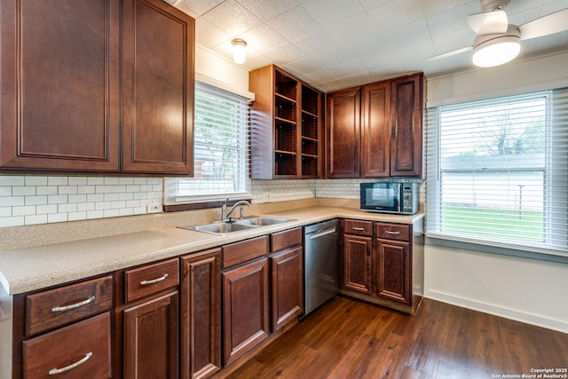 kitchen featuring sink, dark wood-type flooring, a wealth of natural light, decorative backsplash, and stainless steel dishwasher