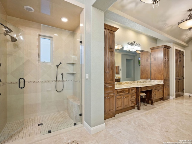 bathroom featuring vanity and walk in shower