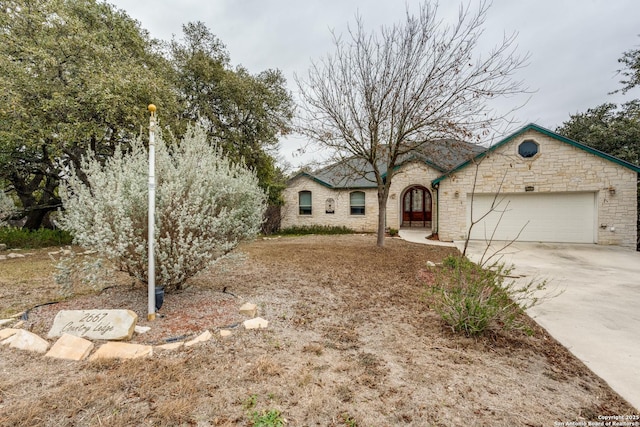 single story home with a garage