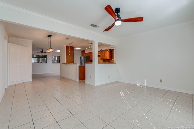 unfurnished living room featuring light tile patterned flooring, ceiling fan, and ornamental molding