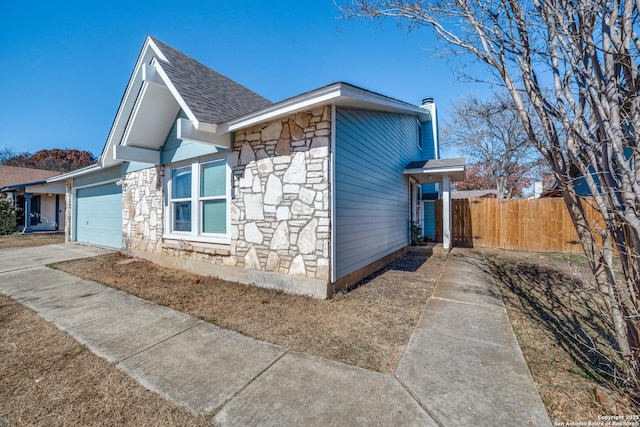 view of home's exterior featuring a garage