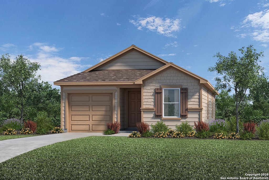 view of front of house featuring a garage and a front lawn