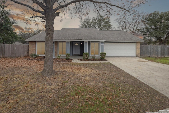 single story home with a garage