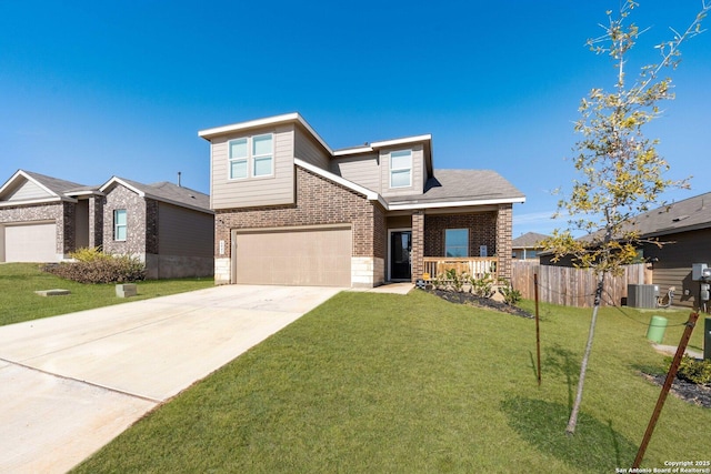 view of front of home with a garage, a front yard, covered porch, and central air condition unit