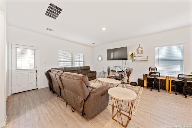 living room featuring light wood-type flooring