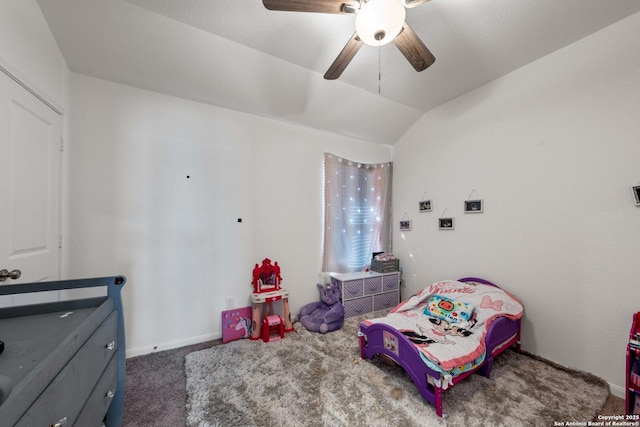 carpeted bedroom with lofted ceiling and ceiling fan