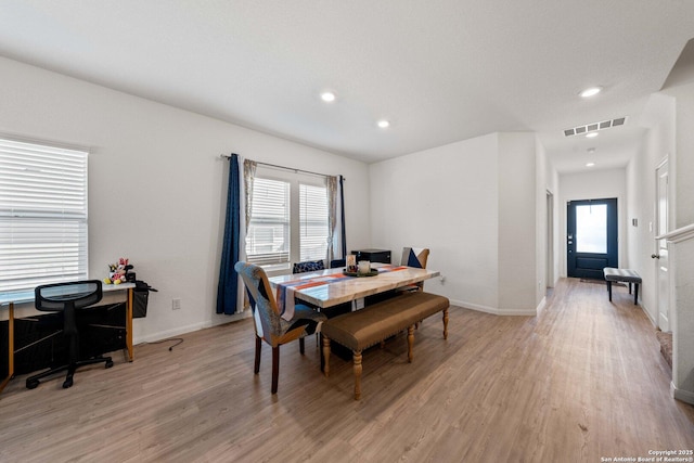 dining room featuring light hardwood / wood-style flooring