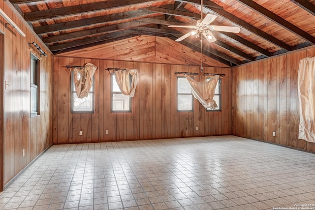 tiled spare room with wood ceiling, ceiling fan, and lofted ceiling with beams