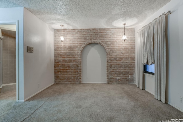 unfurnished living room with carpet